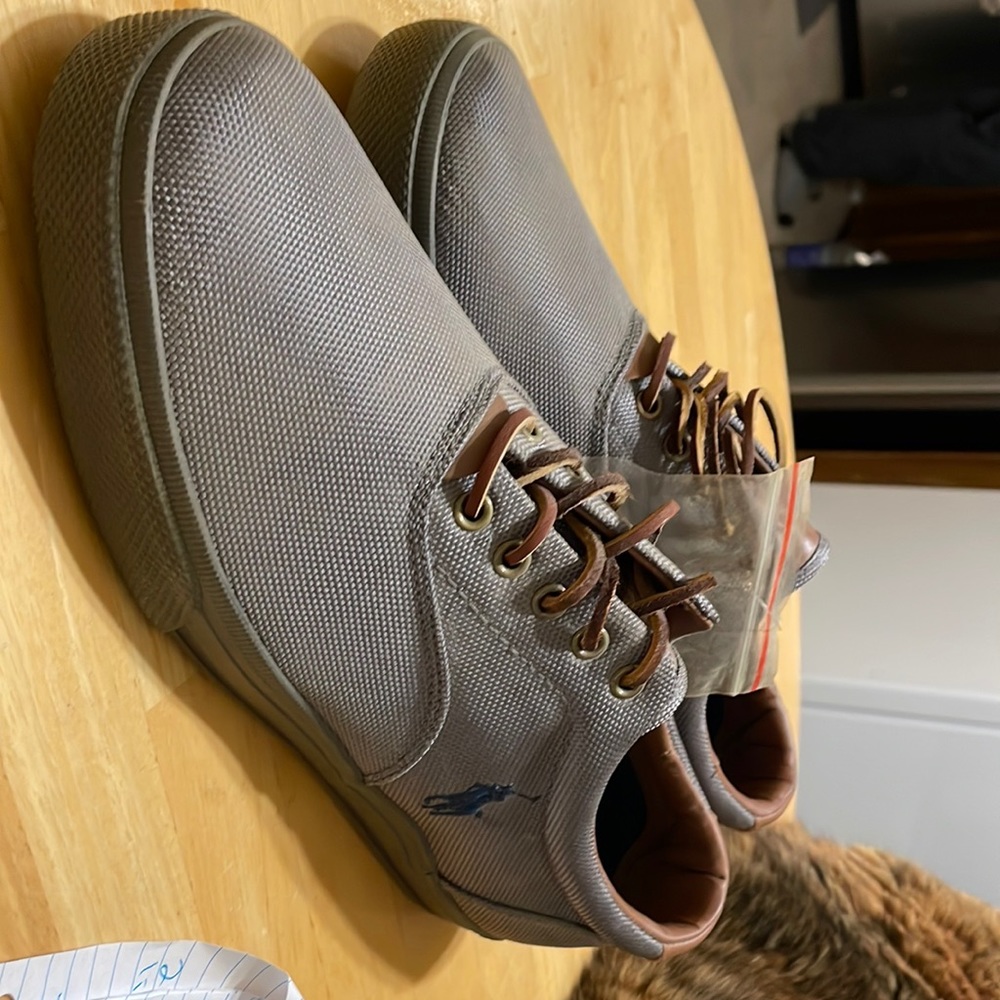 Brand new grey polo Ralph Lauren with leather laces.